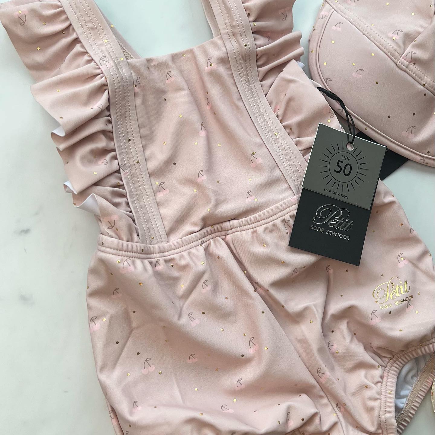 Petit By Sofie Schnoor Badedragt med Kirsebærprint - Lyserød